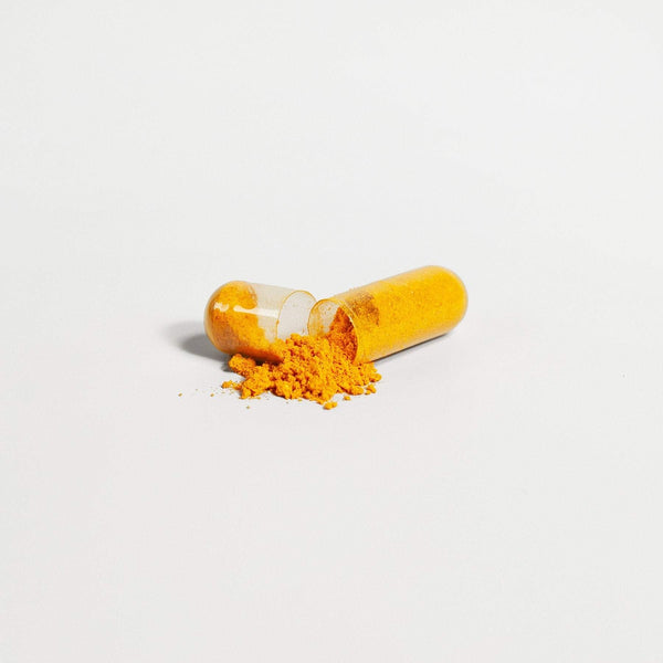 Close-up of Turmeric capsules made with natural curcumin to support inflammation relief and joint health.